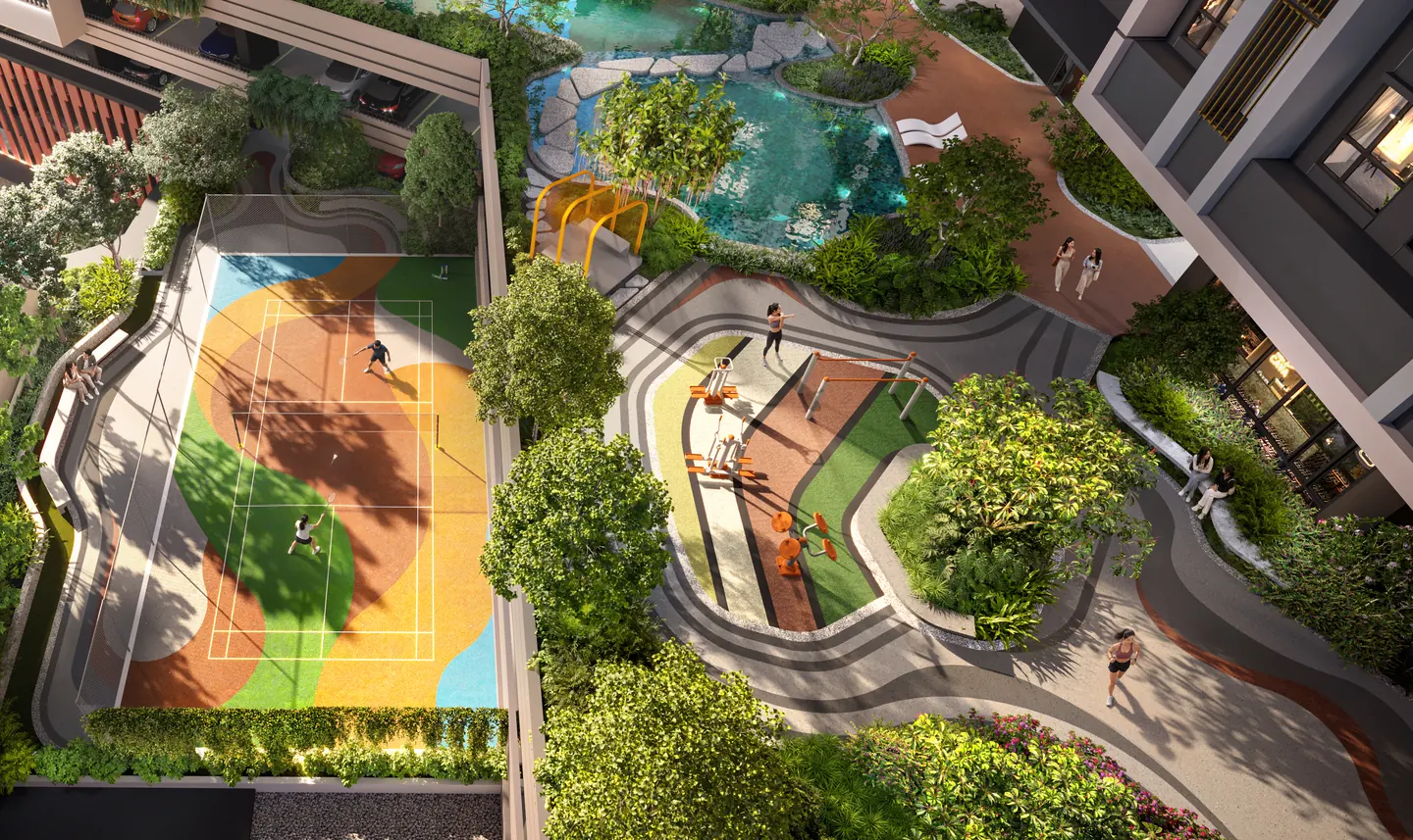 Looking down on the badminton and pickleball court on Level 5, with the pools and gardens of Level 7 beyond.