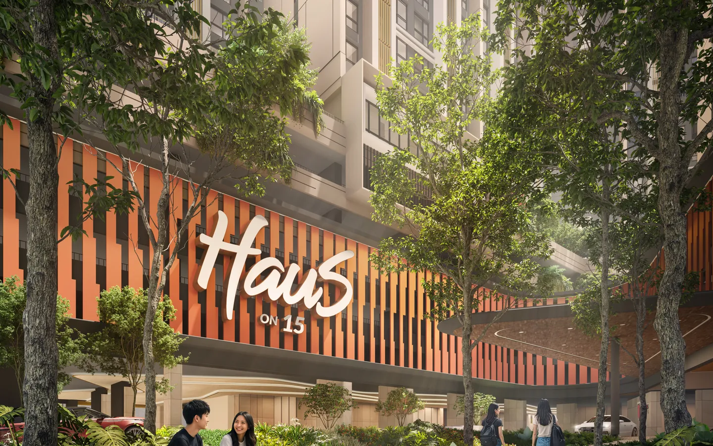The central garden at the foot of the towers, shaded by trees, with the Haus On 15 sign on the orange fins beyond.